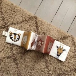 Livre D'éveil En Tissu - Les Animaux De La Savane -Point De Jouet livre en tissu savane carotte et compagnie 3